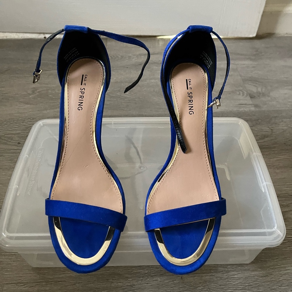 Blue suede heels with gold trim